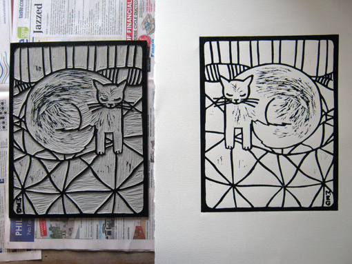"Content" hand coloured, limited edition lino print: Lino block, inked, and a fresh print