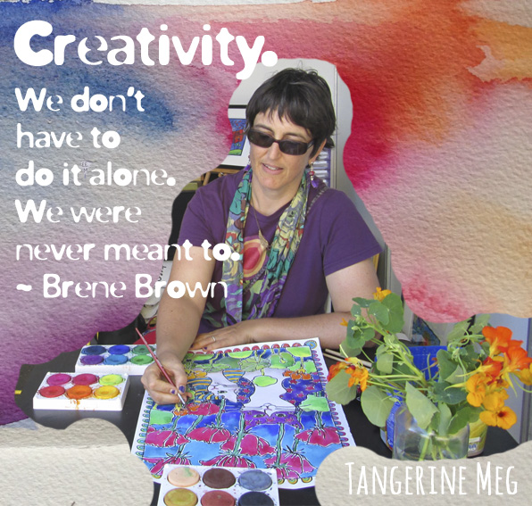 Tangerine Meg demonstrating art making as for art workshops or live painting demonstrations. There's a jar of nasturtiums at her side, she paints some purple cats with pink flowers using student watercolours in rectangular palettes..