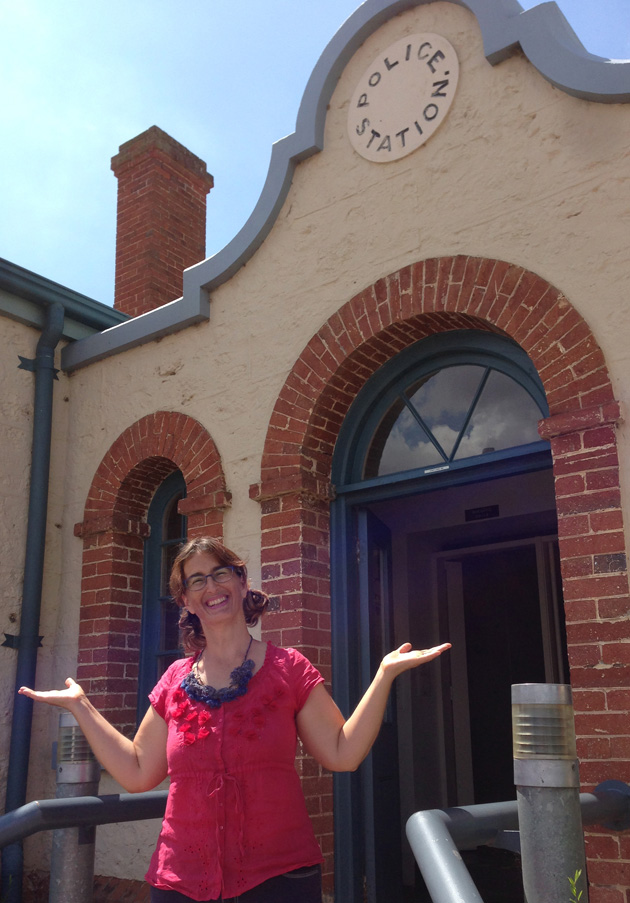 Tangerine Meg on the steps of the old Goolwa Police Station;