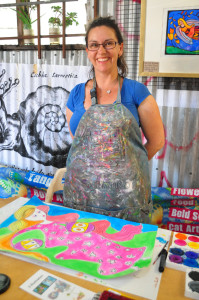 Happy art student Jane and her finished Dream Soul picture