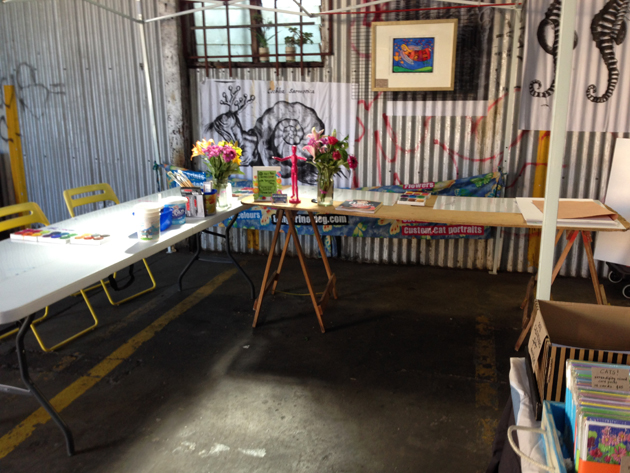 trestle tables set up for art workshop in the big shed at flinders street market
