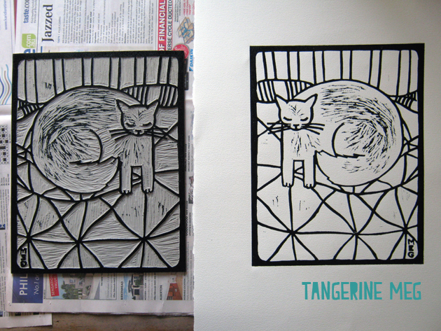 content lino print inked block and freshly printed image