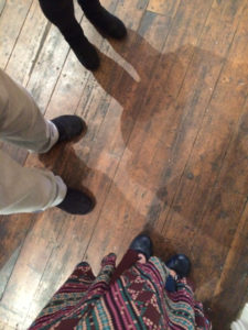 photo of feet at an exhibition launch