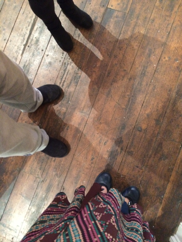 photo of feet at an exhibition launch
