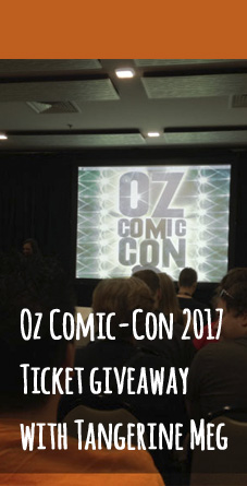 Photo of audience members awaiting a talk by favourite actor, in the meantime a screen displays the 2014 Oz Comic-Con logo. Header overlays.