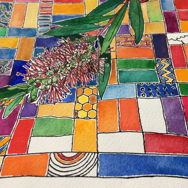 Close up of colourful painting of bottlebrush with a quilt background.
