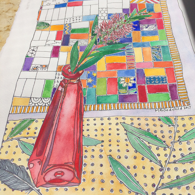 Three quarters complete painting of bottle brush sprig in a red glass bottle with quilt as a background, and spotty leafy fabric on the surface. 
