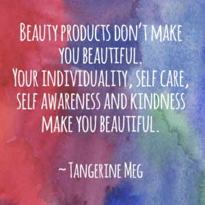 Watercolour background featuring a quote about beauty by Tangerine Meg