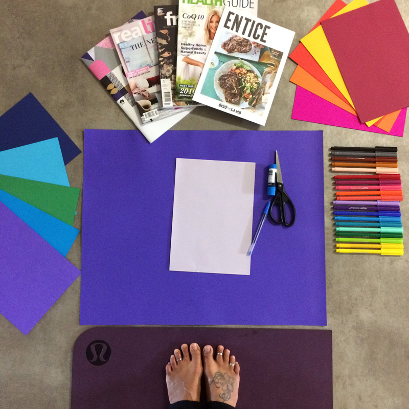 yoga feet with a cool tat surrounded by colourful creating materials
