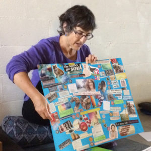 tangerine meg showing her last years vision board
