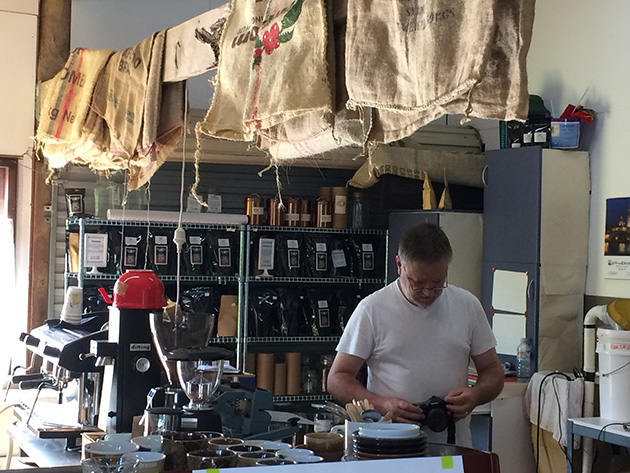 Ben Tugwell of Fleurieu Roast readying a camera to take the header shot of this blog post
